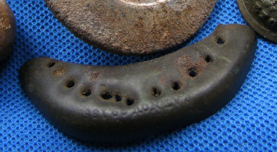 A toe-tap, worn on the tip of a shoe.